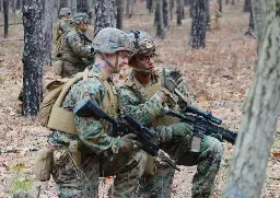 US Marines conducting squad live fire training on range, New Jersey, USA, 2024. [999x706]