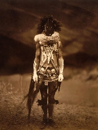 A Navajo man dressed as the hero Nayenezgani, 1904