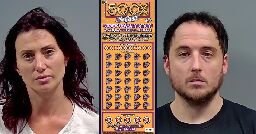 Florida couple caught taping 'crude looking' lottery ticket to claim $1 million prize, cops say