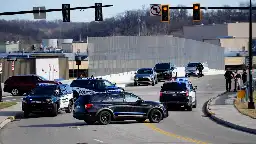 'Hate will never prevail.' Residents confront group displaying swastika flags near I-75