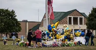 Mother of Georgia Suspect Called School Minutes Before Shooting, Family Says