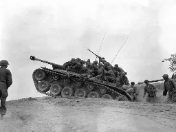 US troops desanting on a tank, Korean War, 1950