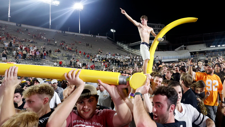 Vanderbilt football topples #1 Alabama, jubilant Vandy fans march goalposts down Broadway and throw them in the Cumberland