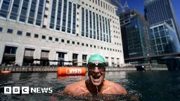 Canary Wharf dock 'completely clean' to swim in