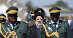 Iranian president welcomed in Zimbabwe with anti-West songs