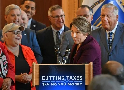 Gov. Healey signs $1 billion tax relief package, reworking tax rebate law, cuts short-term capital gains tax