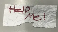 Kidnapping victim's "Help Me!" sign leads to girl's rescue, suspect's arrest