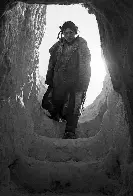 Inuit girl entering an igloo, Nunavut, Canada, ~1950