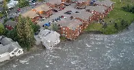 "Glacial outburst" flooding destroys at least 2 buildings, prompts evacuations in Alaskan capital of Juneau