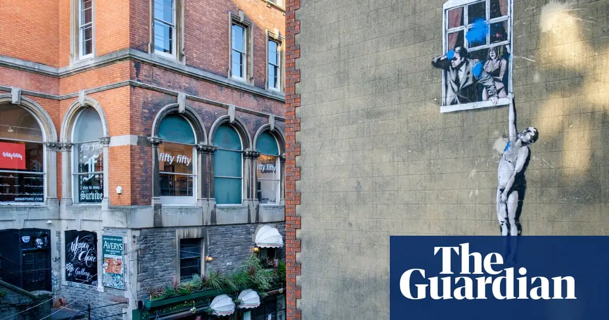 Banksy’s Well Hung Lover to be sold with Bristol building it is painted on