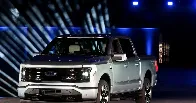 Ford slashes prices of F-150 Lightning trucks as EV wars heat up