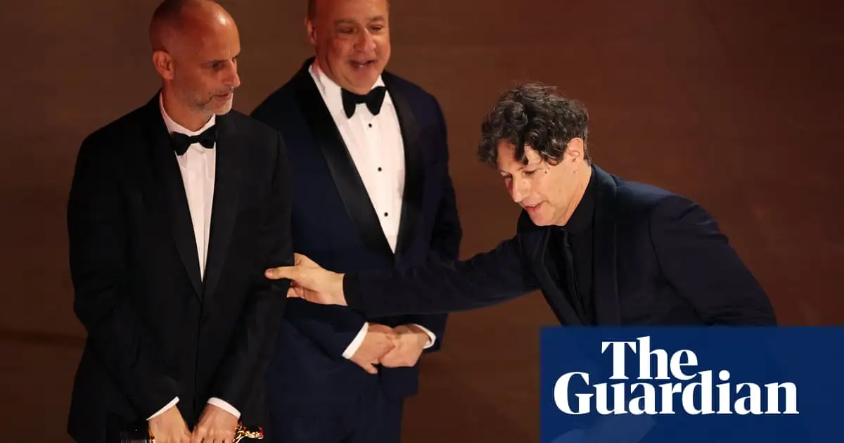 ‘We stand here as Jewish men who refute the Holocaust being hijacked’: Jonathan Glazer calls for end to Gaza attacks at Oscars