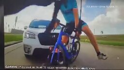 Video Cyclists survive hit-and-run with SUV
