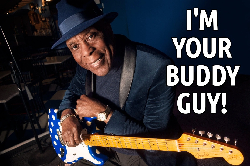 Photo of the musician Buddy Guy smiling to camera, captioned &quot;I&#39;m your Buddy Guy!&quot;