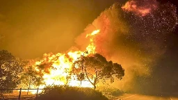 Dozens evacuate and 10 homes are destroyed by a wildfire burning out of control on the edge of Perth