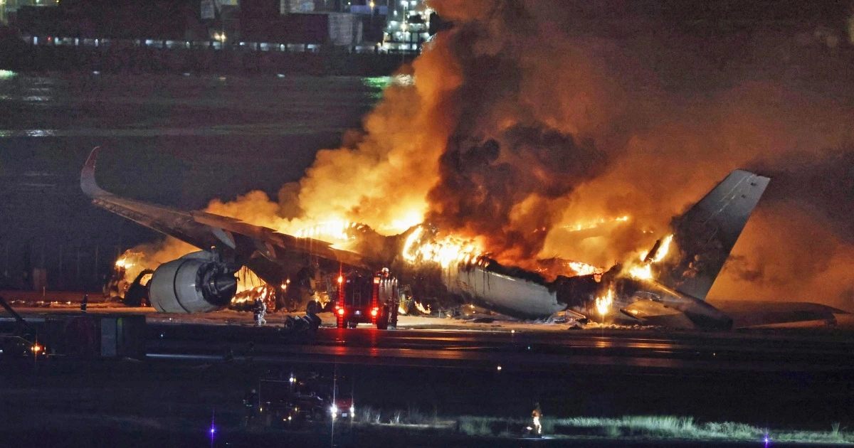 Plane engulfed in flames at Japan airport after collision kills 5