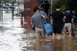 [Photo News] Commuting scenes after heavy rains batter S. Korea