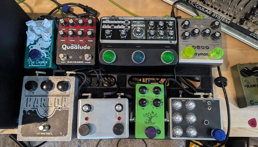 A guitar pedal board with various pedals