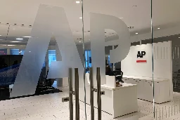 AP strikes Christmas Eve deal with union on contract