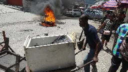 Haitian police tear-gas peaceful protesters as they demand help in stopping gangs