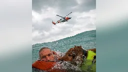 Man and his dog rescued from disabled boat 25 miles out to sea as Hurricane Helene fast approached