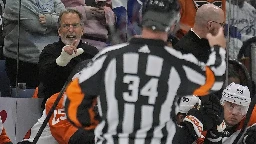 Flyers coach John Tortorella reluctantly leaves bench after being tossed in game against Lightning