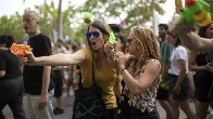 Barcelona anti-tourism protesters fire water pistols at visitors