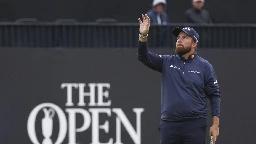 Dan Brown makes late birdies for a 1-shot lead over Shane Lowry in wind-challenged British Open