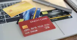 Americans continue to rack up credit card debt, hitting a record $1.14 trillion