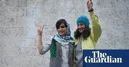 Iranian journalists celebrating release from jail charged for not wearing hijab