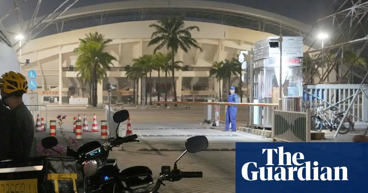 Dozens killed in China after car driven into sports centre