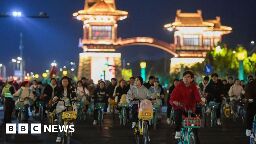 China roads blocked by thousands of cyclists in night quest for dumplings