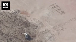 Teens rescued after pilots spot 'help' written in sand