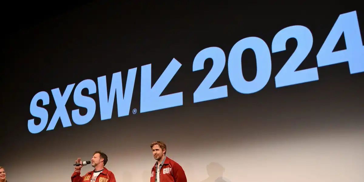 Festival crowd boos at video of conference speakers gushing about how great AI is