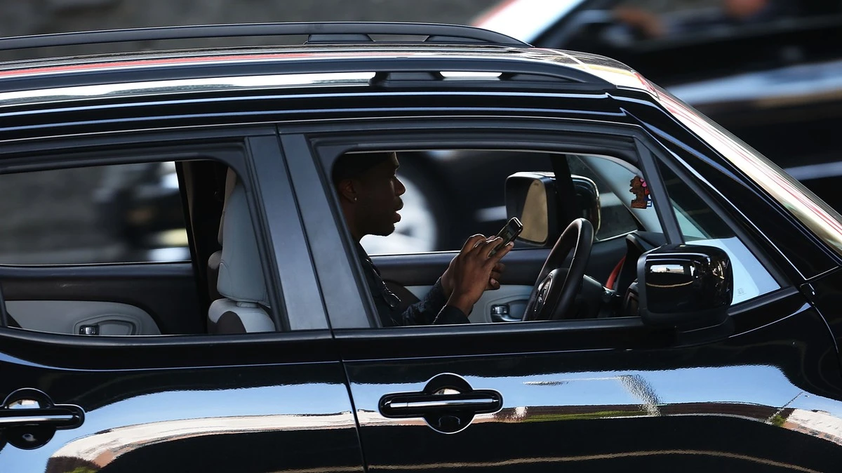 More People Are Watching Videos on Their Phones While Driving. Often, It’s Perfectly Legal.