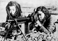 Japanese schoolgirls training with a machinegun for the anticipated American invasion of Japan, WW2, 1945