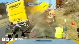 Moment highway worker dodges high-speed truck crash