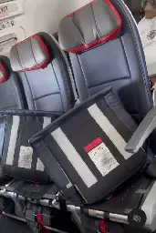 American Airlines Flight Attendant Rips Off Seat Cushions to Stop Passengers From Grabbing Free Extra Legroom - View from the Wing