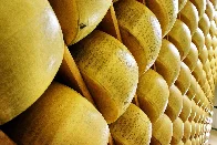 Italian man crushed to death by thousands of falling cheese wheels