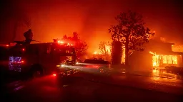 More than 30,000 told to evacuate as fire rips through California