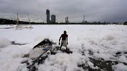 Toxic foam coats sacred river near New Delhi as Indian capital battles hazardous pollution | CNN