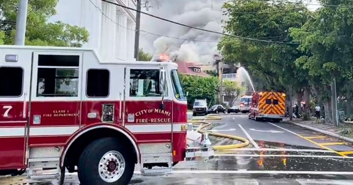 Massive fire breaks out at Miami apartment building, employee of building found shot at scene