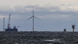 Decades after Europe, turning blades send first commercial offshore wind power onto US grid