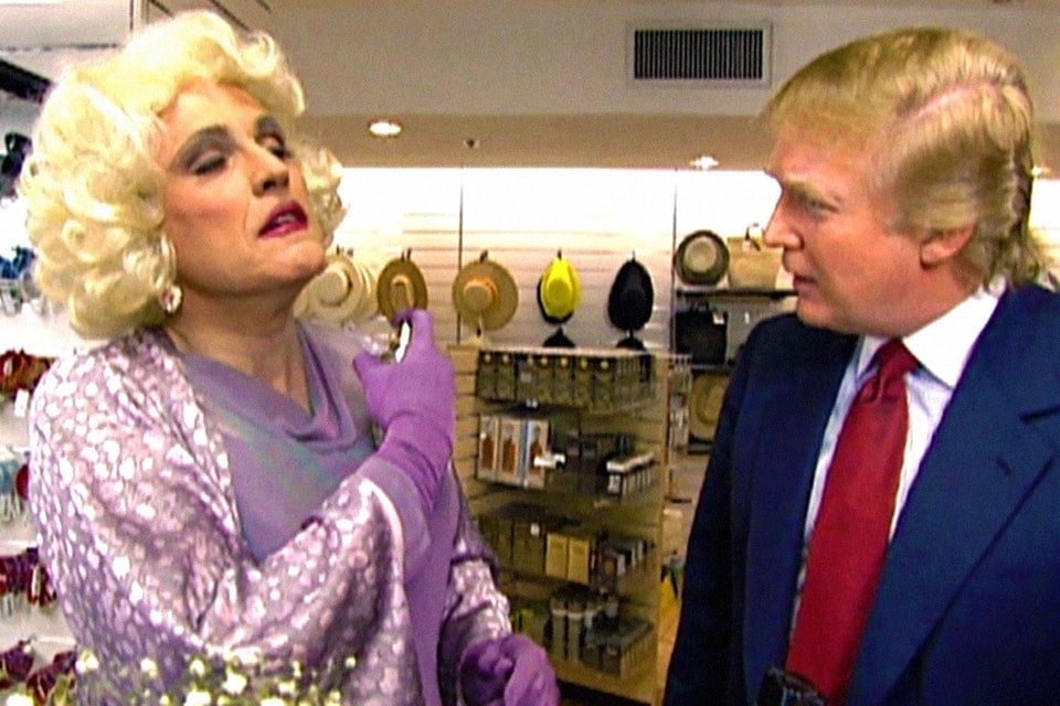 Rudy Giuliani in drag standing with Trump