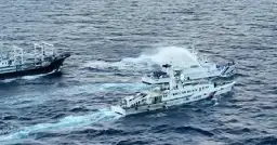 Philippines says Chinese coast guard assaulted its vessels with water cannons for a second day