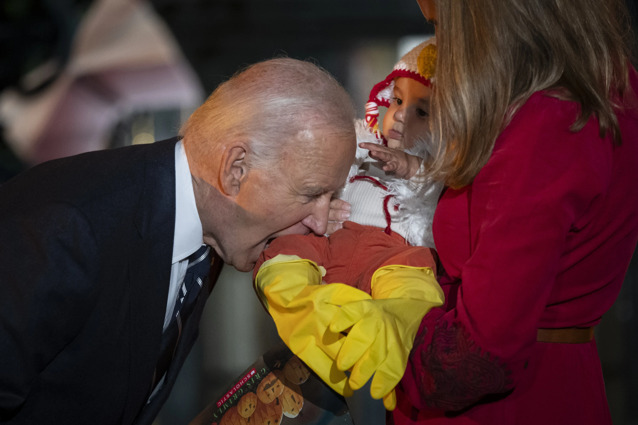 Joe Biden bites several babies at Halloween event