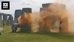 Climate protesters arrested after spraying Stonehenge with orange powder paint