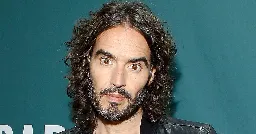 Russell Brand Was Reportedly Called Out As Sexual Predator Several Times On Camera