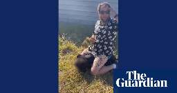 Barkly regional mayor sits on young Indigenous boy while another man threatens to kill him – video