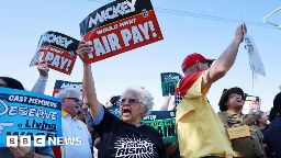 Disneyland workers want to strike - but love the magic